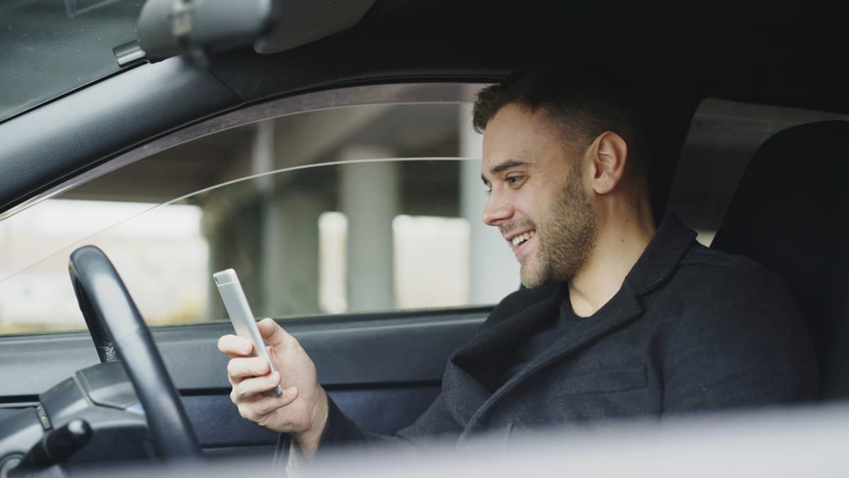 Man messaging his care team from his phone